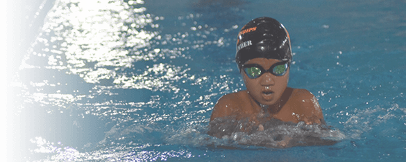 young boy at swim training in Bangkok